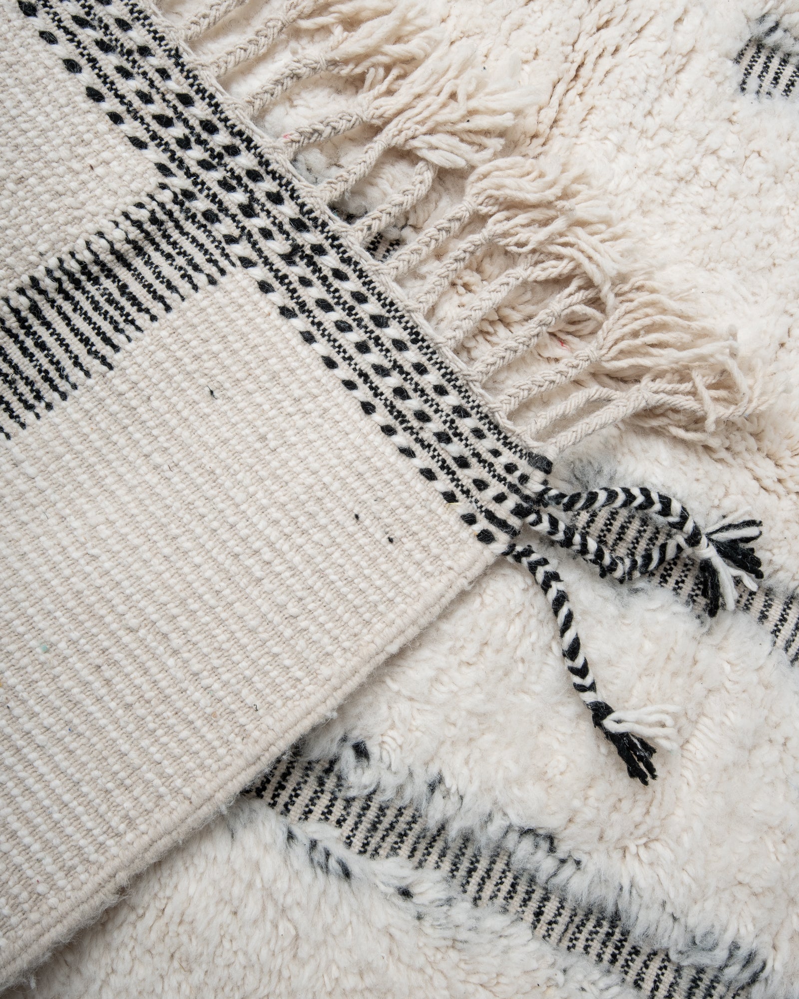 Modern, designer, handcrafted Berber rug from Morocco. Beniourain carpet with beautiful colours and patterns and fluffy wool texture.